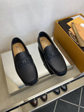 Tod's Black Leather Penny Loafers — hero