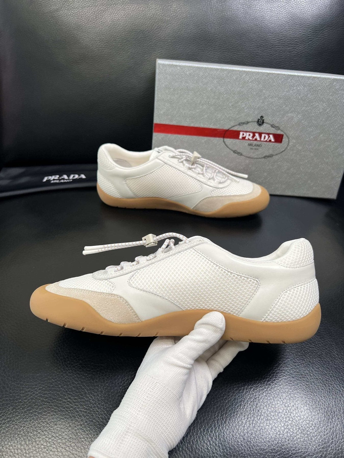 Prada White Gum Sole Low-Top Sneakers — model