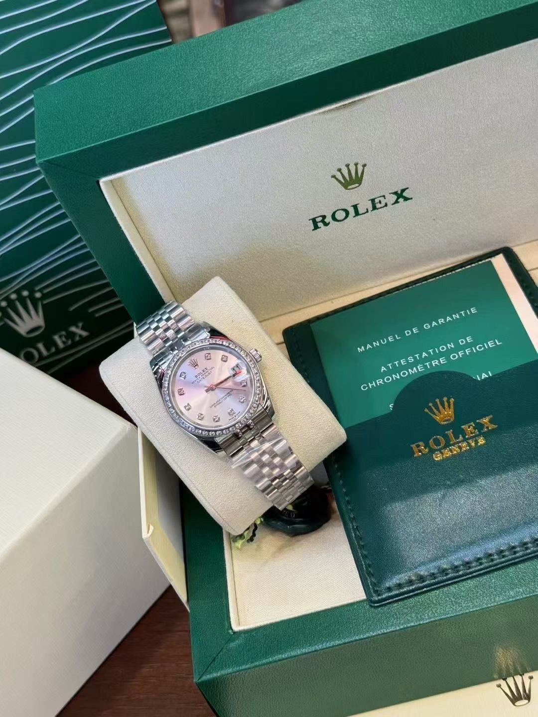Rolex Iridescent Dial Metal Bracelet Watch — front