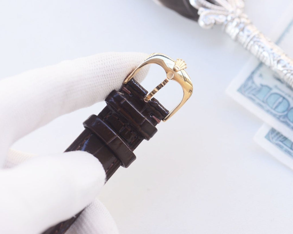 Rolex Gold Brown Strap Watch — detail
