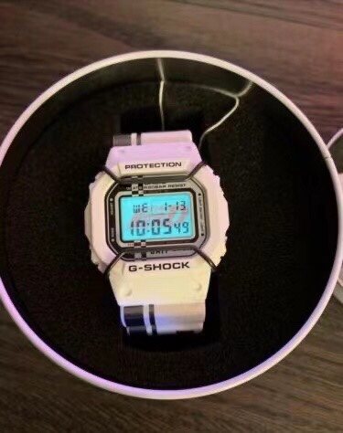 G-SHOCK White Black Strap Watch — front