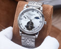 Patek Philippe Silver Gold White Dial Bracelet Watch — hero