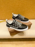 Black and Gray Patterned Low-Top Sneakers — hero