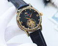 Patek Philippe Gold Black Dial Leather Strap Watch — hero
