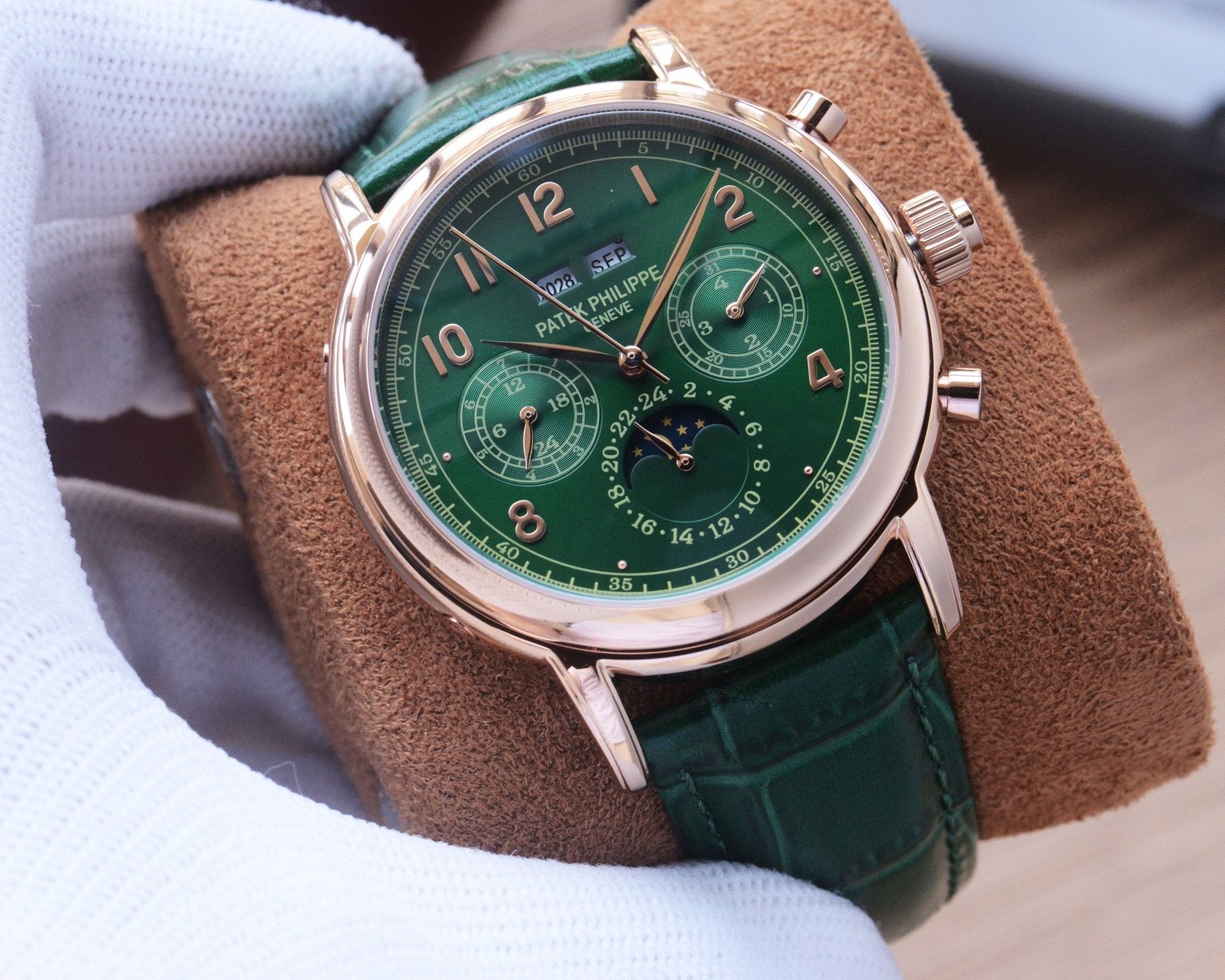 Patek Philippe Rose Gold Green Dial Strap Watch — hero