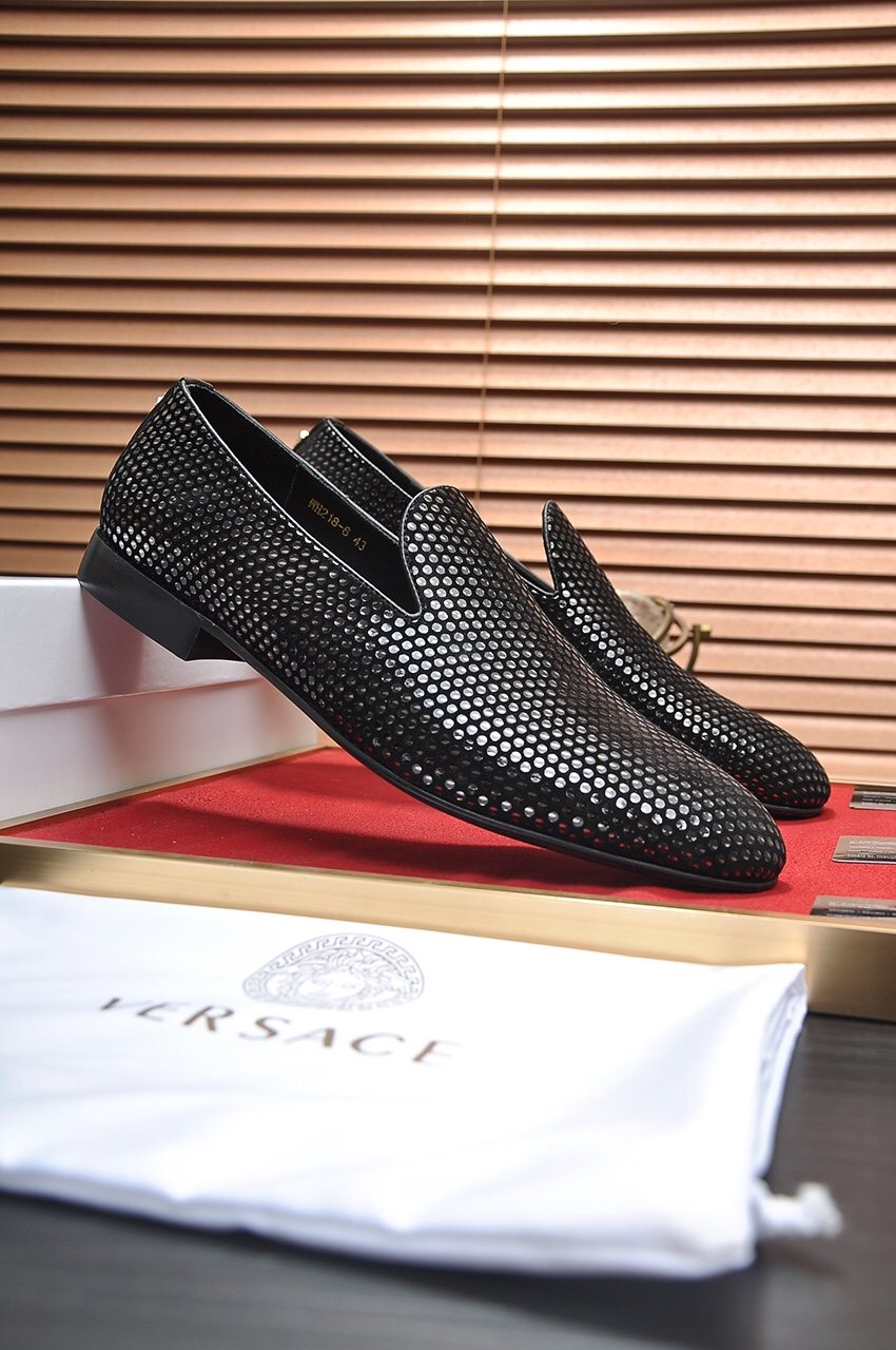 Versace Textured Black Slip-On Shoes — hero