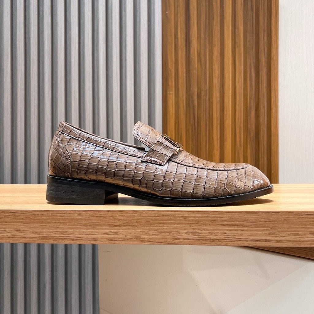 Hermès Brown Textured Loafers — side