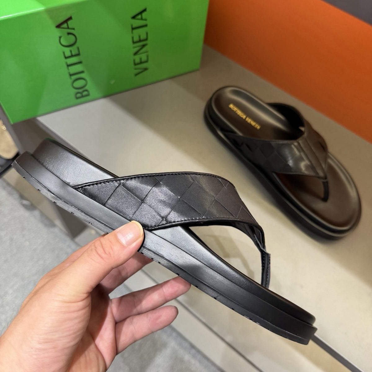 Bottega Veneta Black Woven Thong Sandals — model