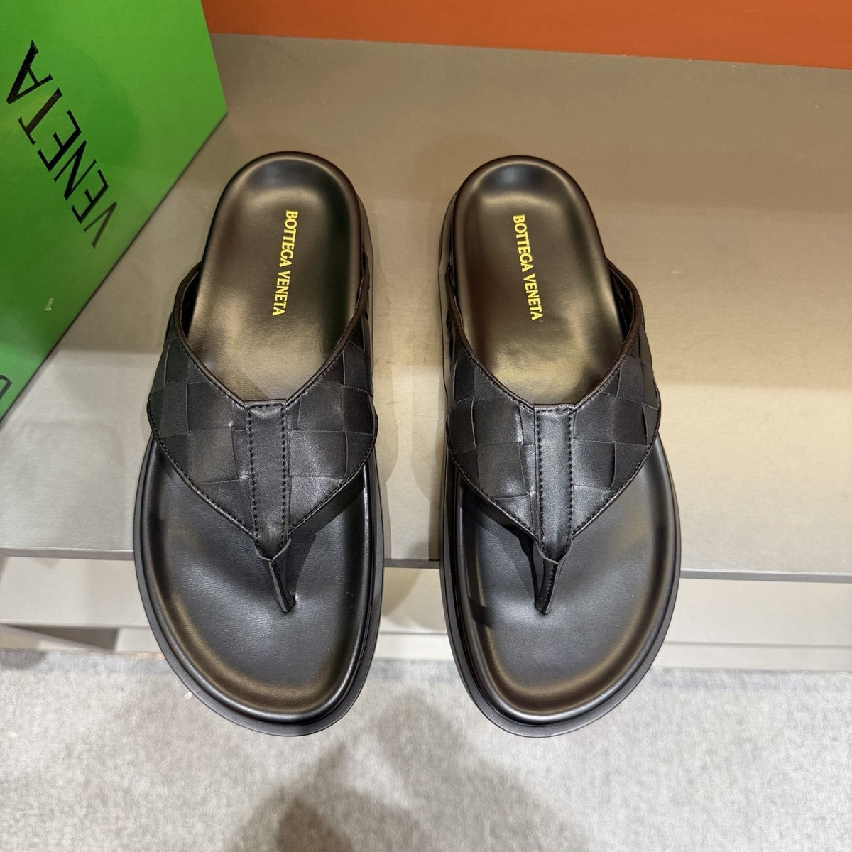 Bottega Veneta Black Woven Thong Sandals — hero