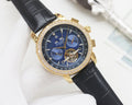 Patek Philippe Gold Black Blue Dial Strap Watch — hero