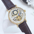 Patek Philippe Gold Brown Strap Watch — hero