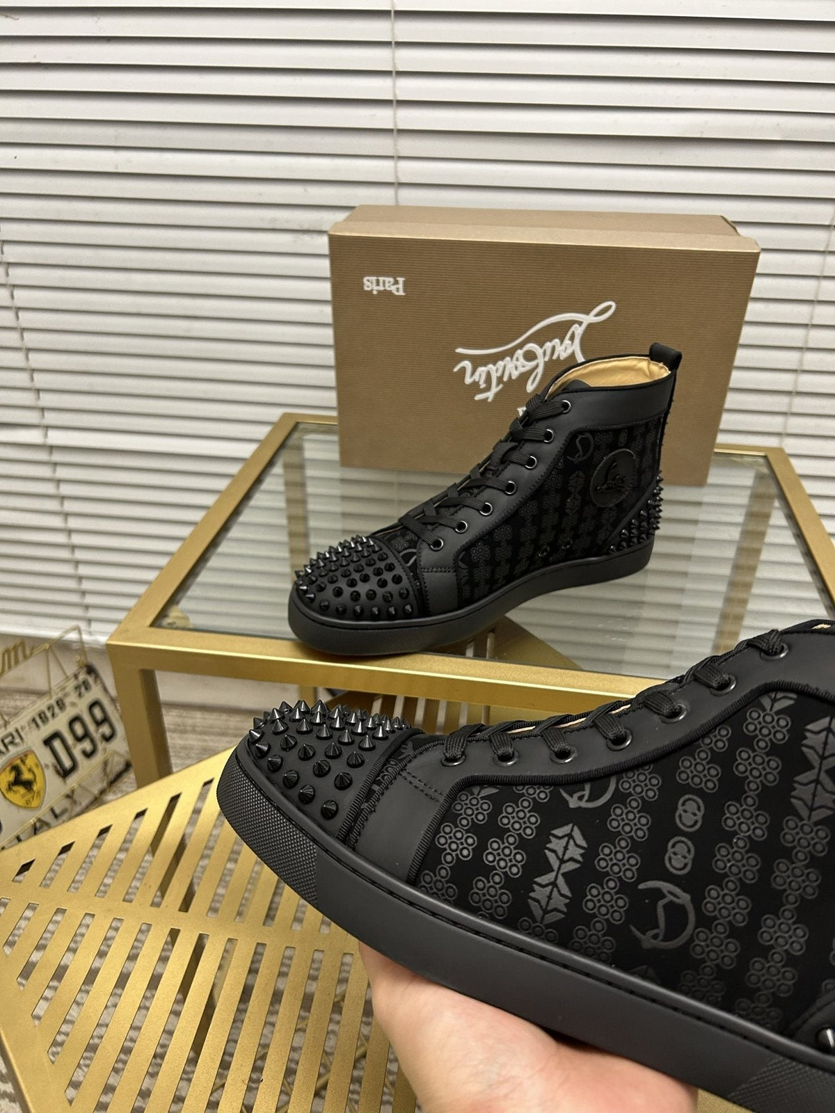 Christian Louboutin Black Studded High-Top Sneakers — detail