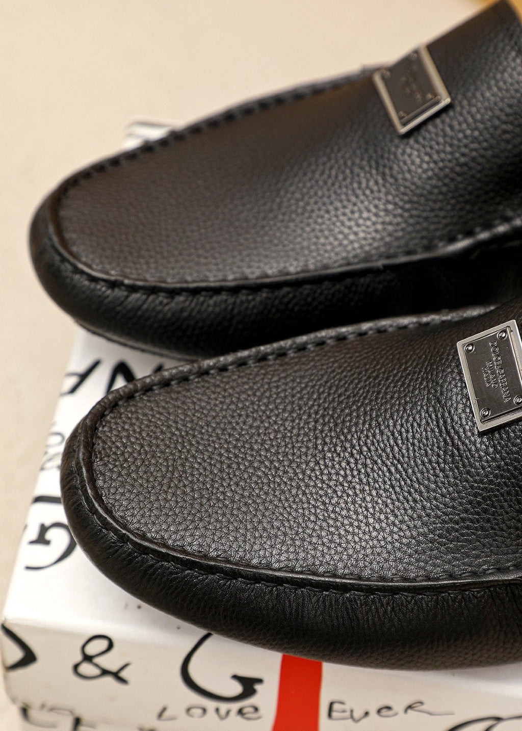 Dolce & Gabbana Black Metal-Accent Slip-On Loafers — detail