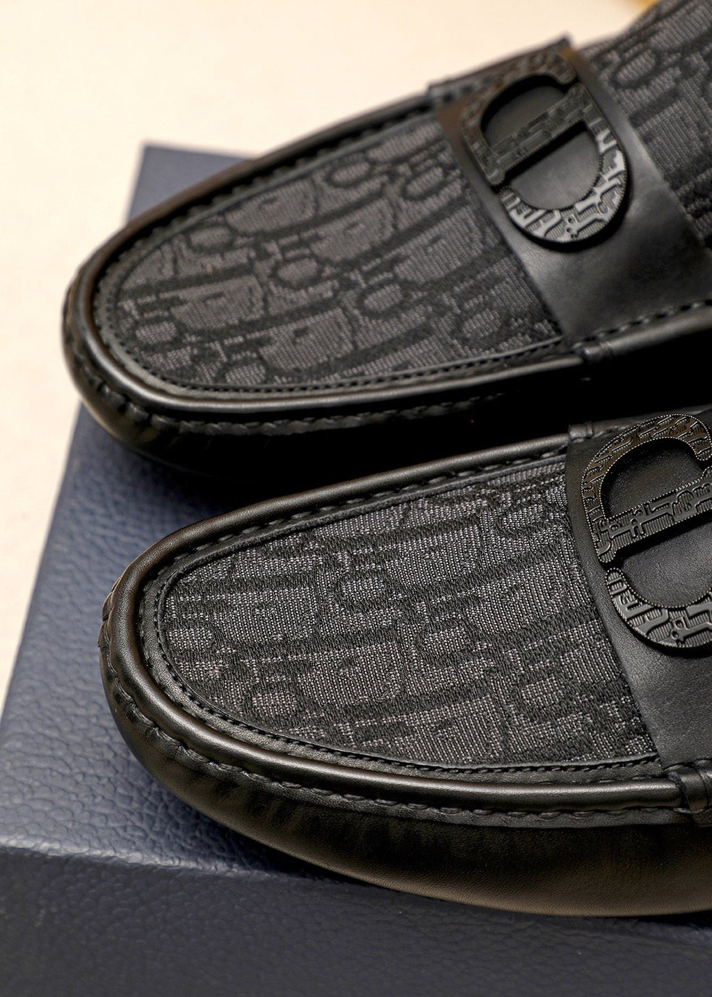 Dior Black Embossed Buckle Loafers — detail