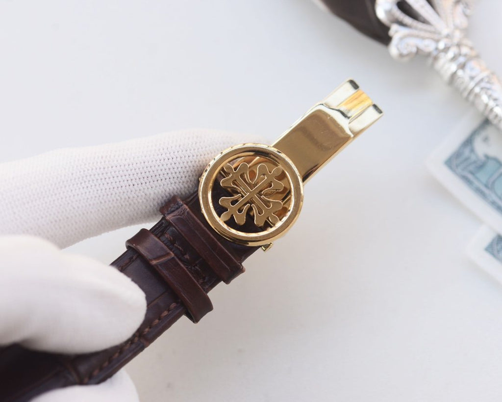 Patek Philippe Gold Brown Dial Strap Watch — detail