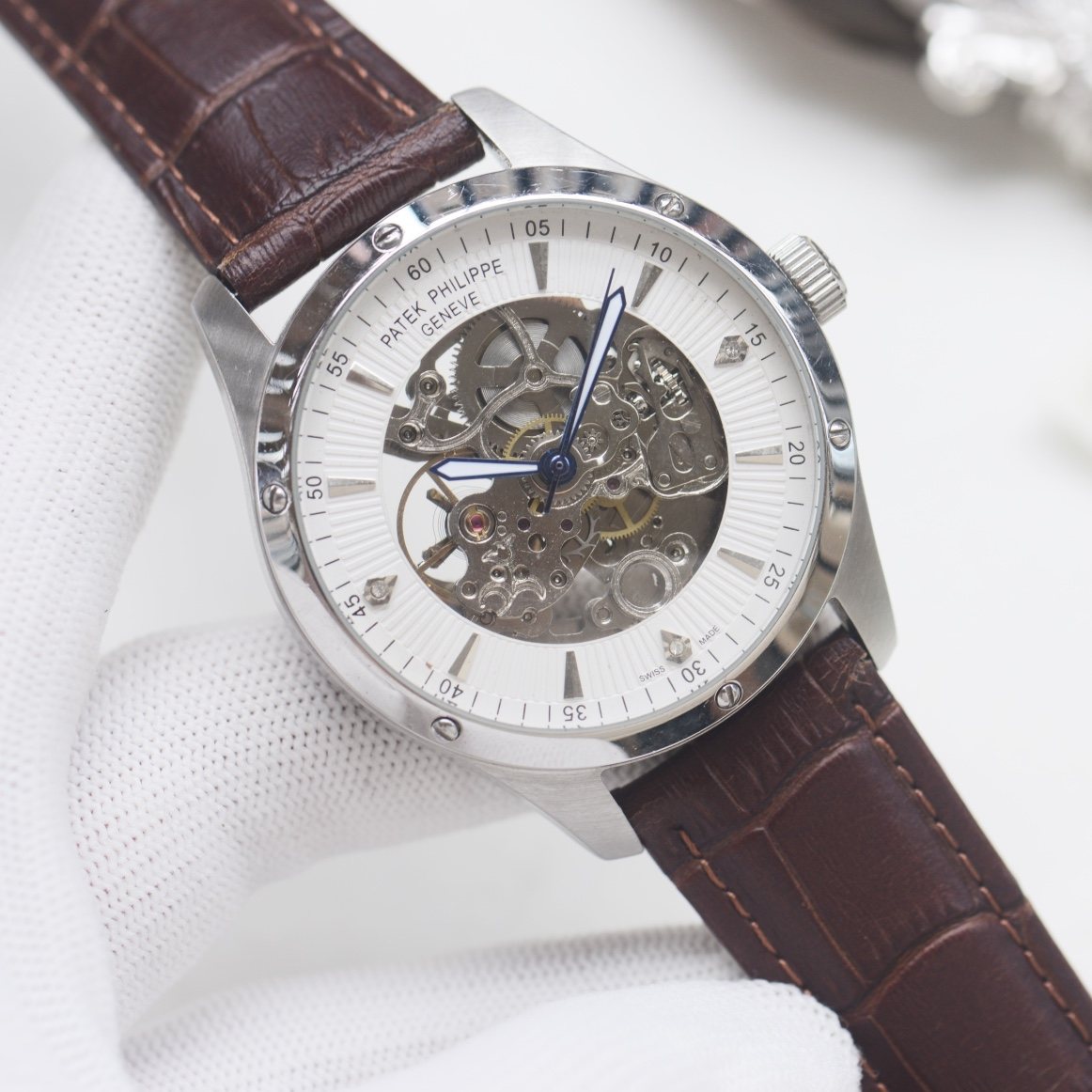 Patek Philippe Silver White Strap Watch — hero
