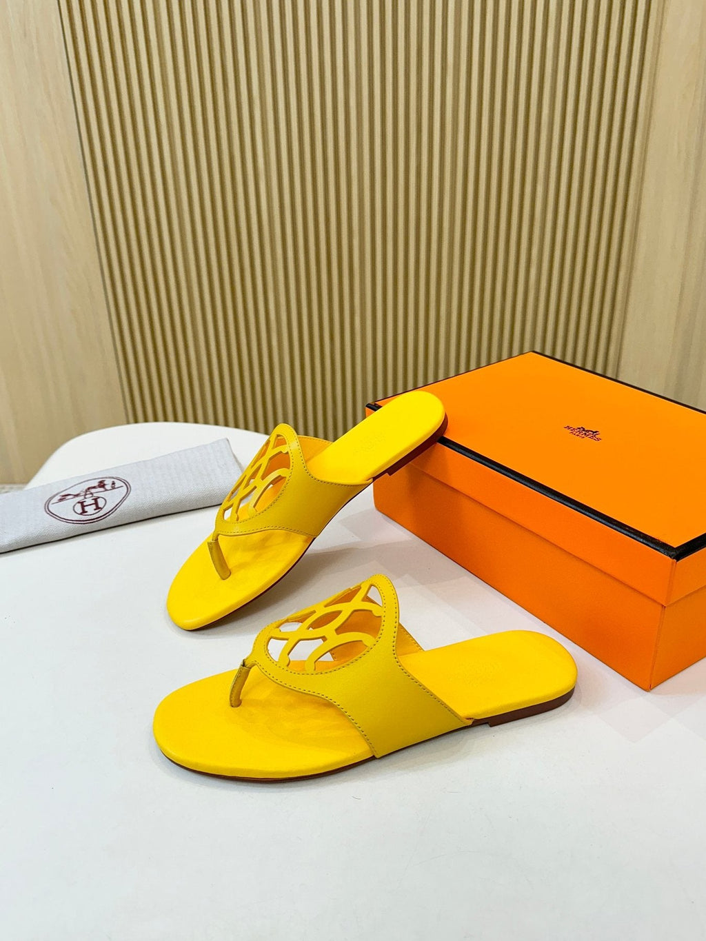 Hermès Cutout Strap Thong Sandals — side
