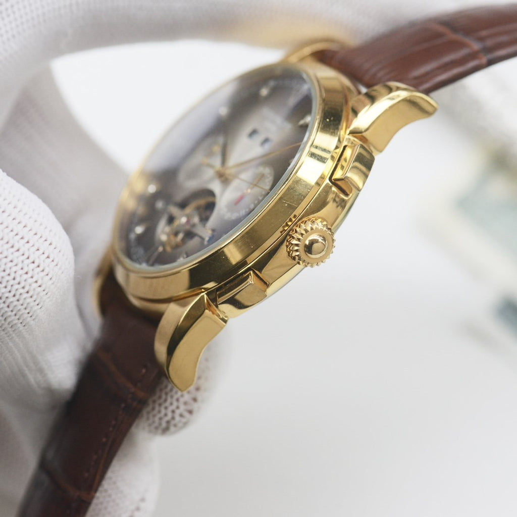 PATEK PHILIPPE Gold Brown Leather Strap Watch — side