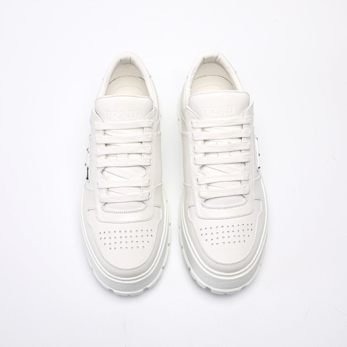 PRADA Triangle Plaque Low-Top Sneakers — front