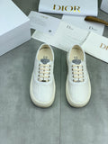 Dior White Embossed Low-Top Sneakers — hero