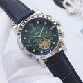 Patek Philippe Silver Blue Green Dial Strap Watch — hero