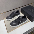 Armani Exchange Paneled Low-Top Sneakers — hero