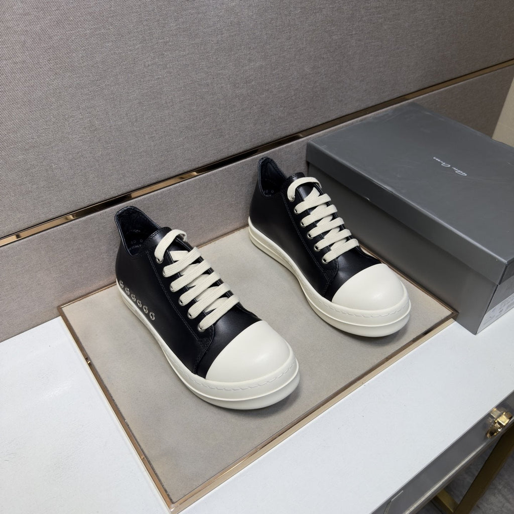 Black and Off-White Low-Top Sneakers — front