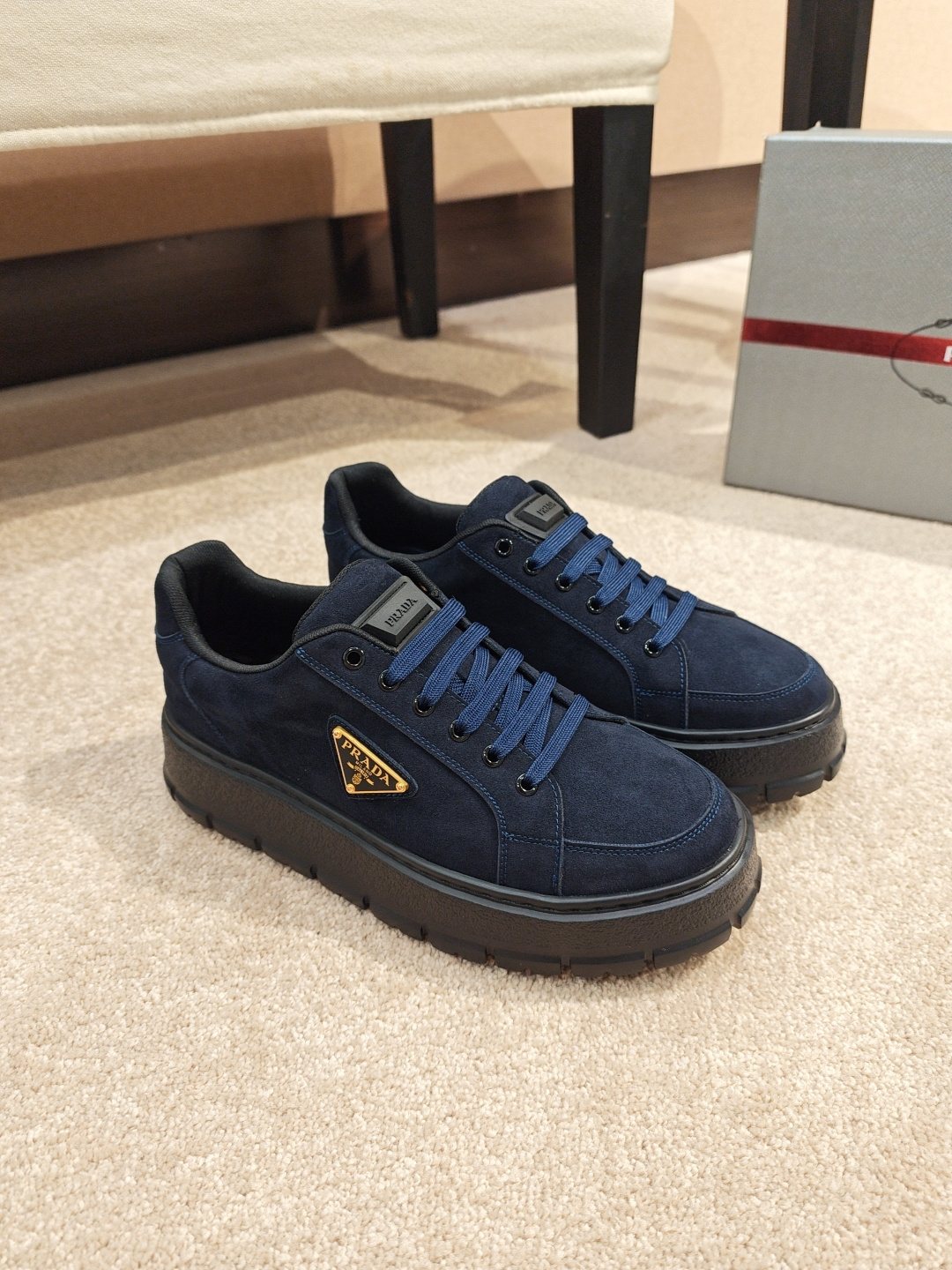 Prada Triangle Plaque Low-Top Sneakers — front