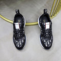 Dior Patterned Lace-Up Sneakers — hero