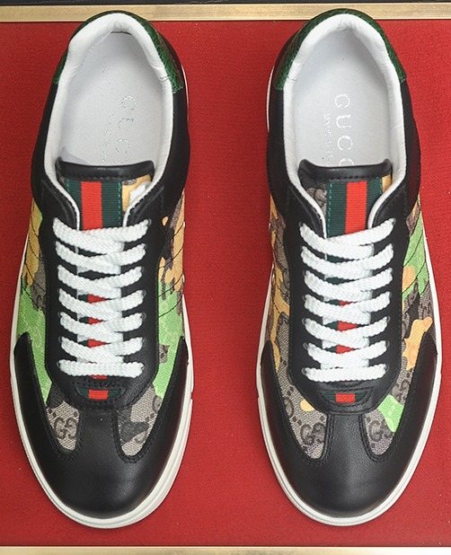 Gucci Patterned Panel Low-Top Sneakers — hero