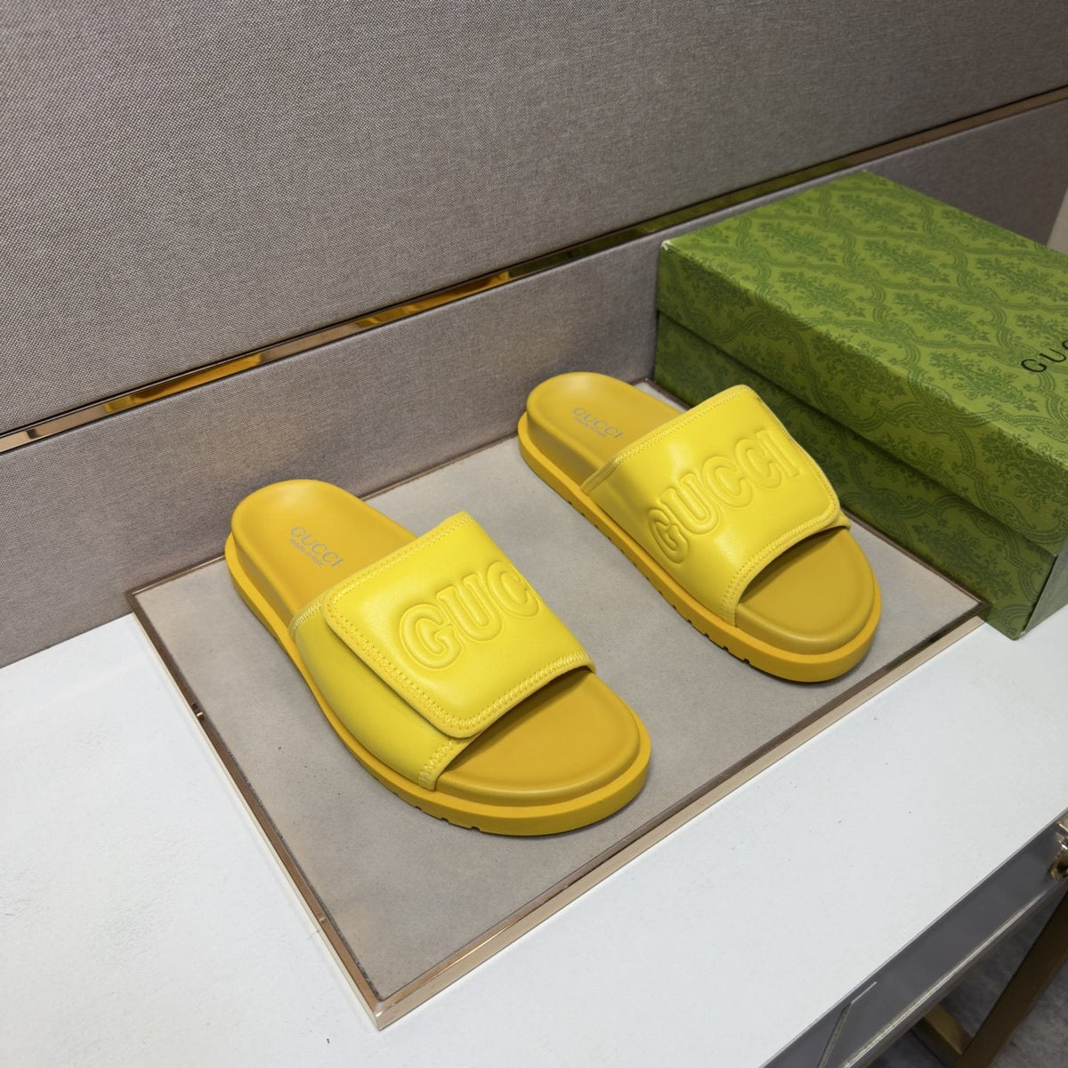 Gucci Raised Logo Slide Sandals — front