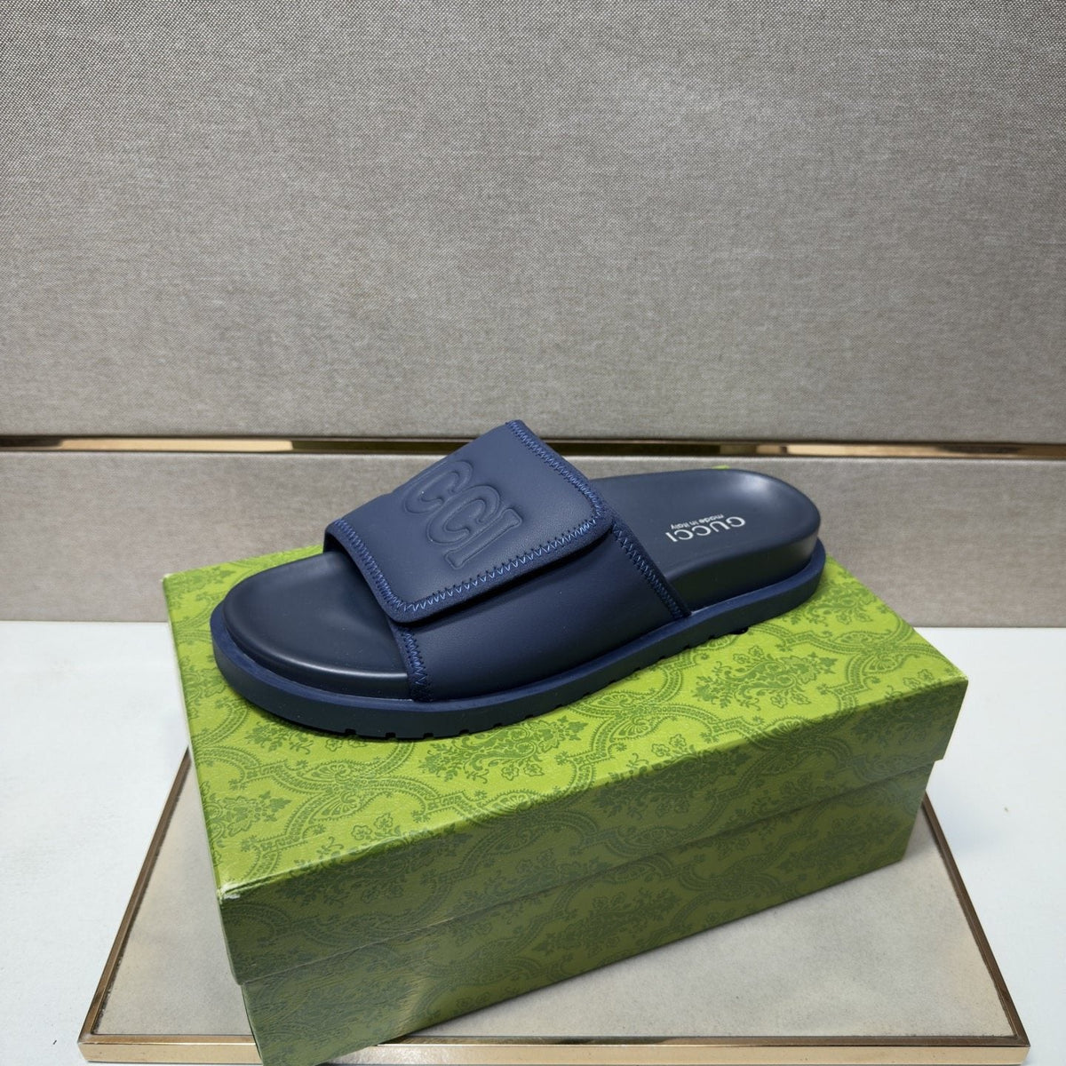 Gucci Raised Logo Slide Sandals — front