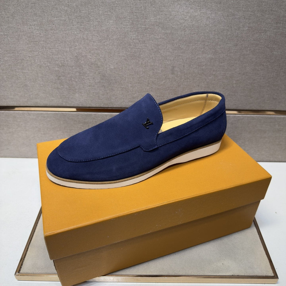 Louis Vuitton Men’s Textured Slip-On Loafers — front