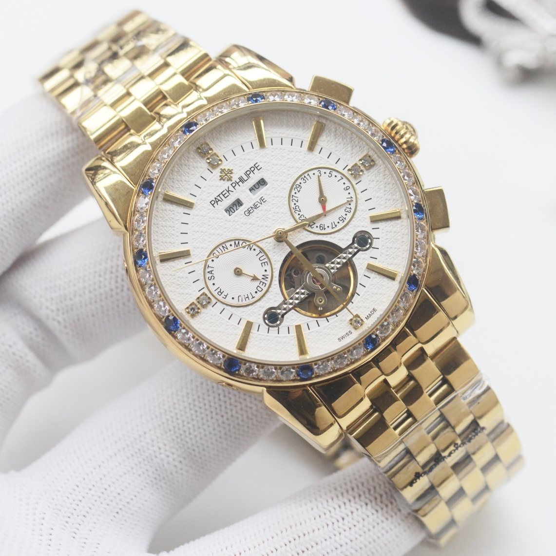 PATEK PHILIPPE Gold Blue White Dial Bracelet Watch — hero